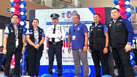 SG Hassan Pasco receives a Plaque of Recognition from CDRRMO.